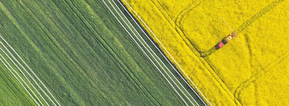 DRE-TIER1_CMYK_Harvest-with-tractor-large-950x350-min.jpg