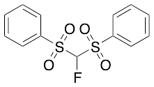 (Fluoromethylenedisulfonyl)dibenzene